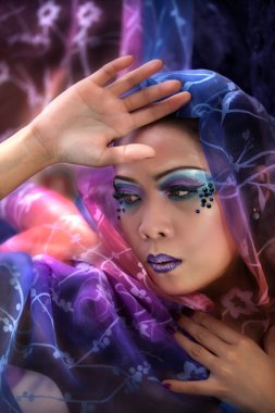 Asian Woman Wearing a Colorful Veil clipart