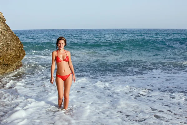 Young woman in red bikini — Stock Photo, Image