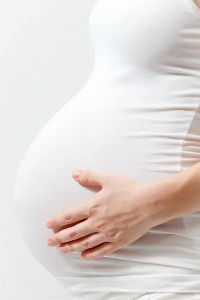Zwangere vrouw raken hier buik — Stockfoto