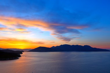 Beautiful sunset over Aegean sea clipart