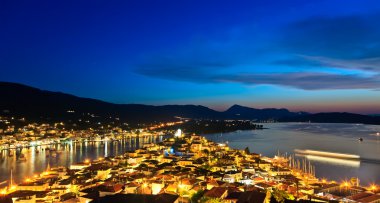 Greek island Poros at night clipart