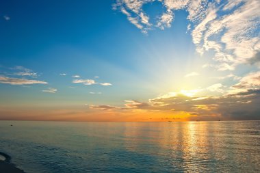 Sunrise over Atlantic ocean clipart