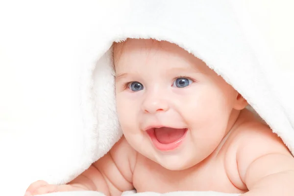 Leuke glimlachende baby — Stockfoto