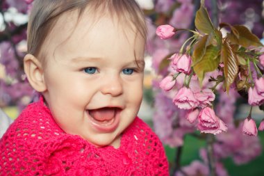 Cute smiling baby girl clipart