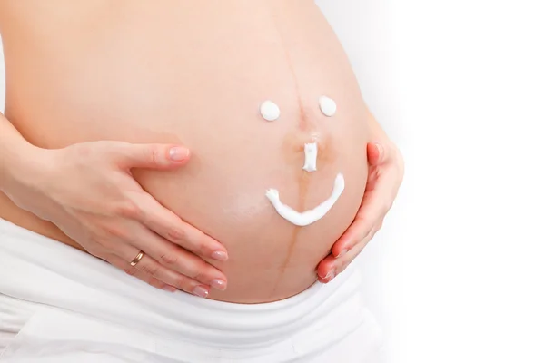Close-up da barriga da mulher grávida — Fotografia de Stock