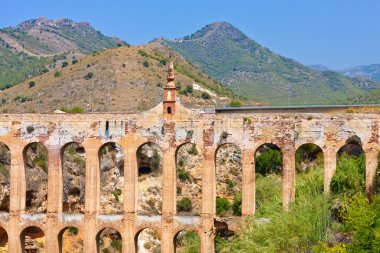 Old aqueduct in Nerja, Costa del Sol, Spain clipart