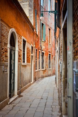 Narrow street in Venice clipart