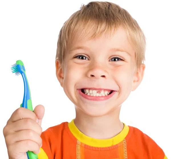 Menino sem um dente com escova de dentes — Fotografia de Stock