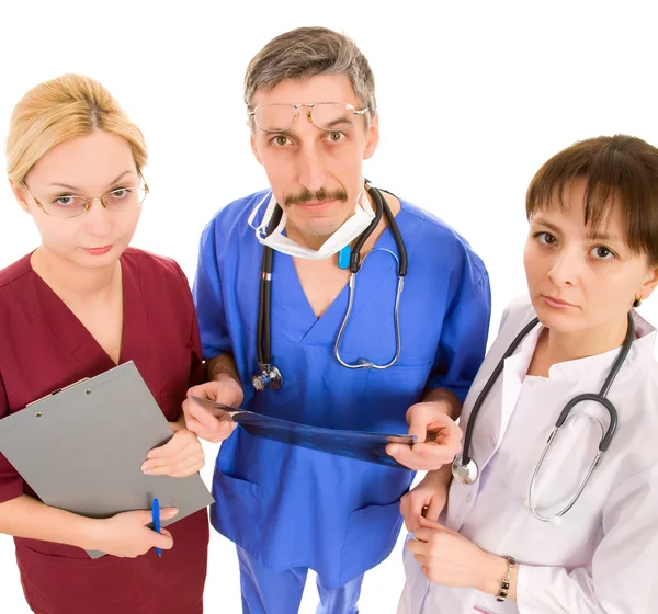 Comic doctor with his team — Stock Photo, Image