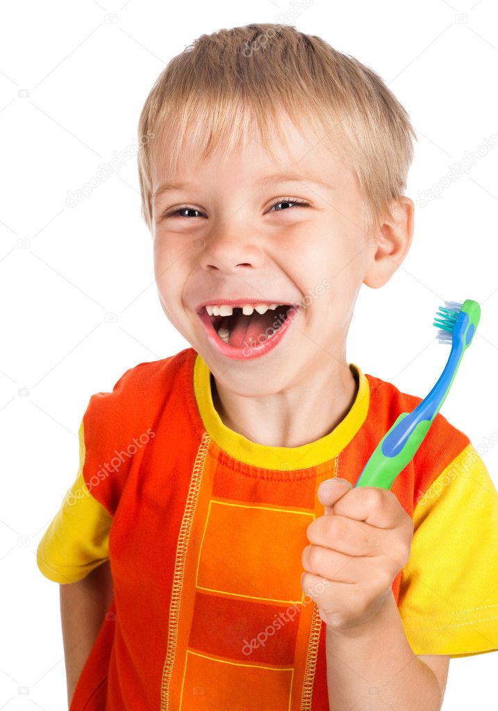 Left-handed smiley boy with toothbrush