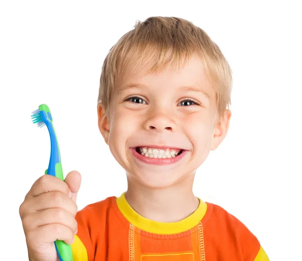 Αγόρι καθαρίζει τα δόντια ενός — Φωτογραφία Αρχείου