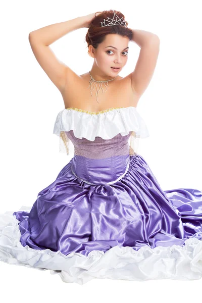 Ung kvinna i bollen klänning och med diadem — Stockfoto
