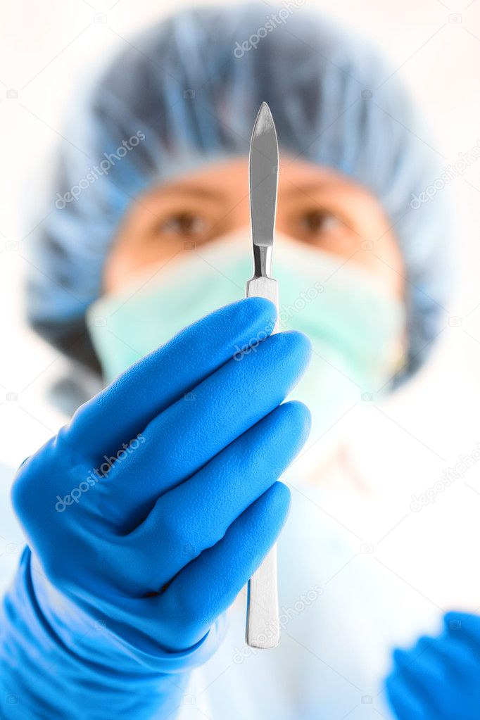 Female surgeon with scalpel