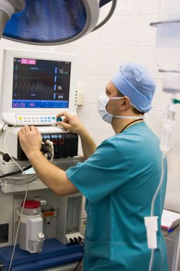 Anaesthetist in operation room clipart