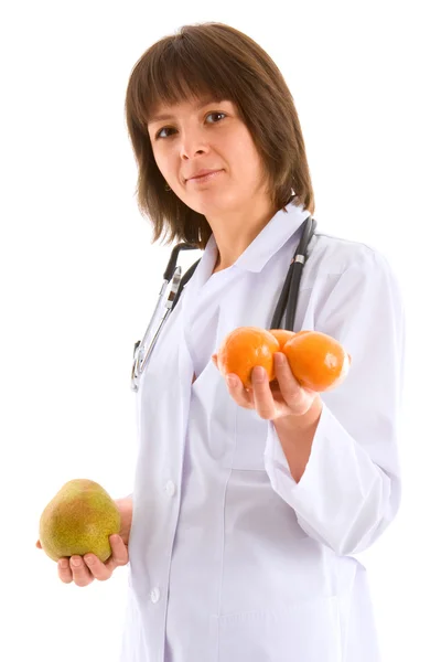 Доктор з фруктами в руках — стокове фото