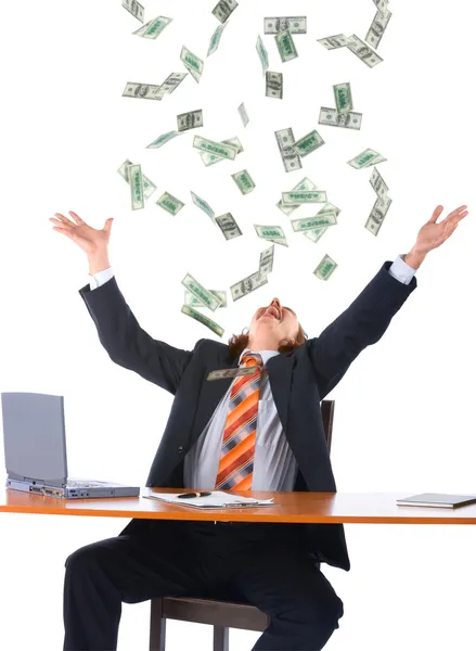 Young businessman and falling money — Stock Photo, Image
