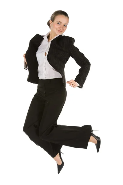 Smiling young jumping woman — Stock Photo, Image
