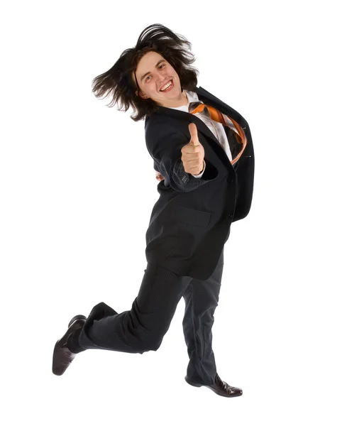 Jumping successful young businessman — Stock Photo, Image