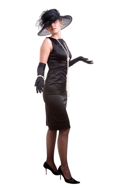 Ung kvinna med hatt och handskar — Stockfoto