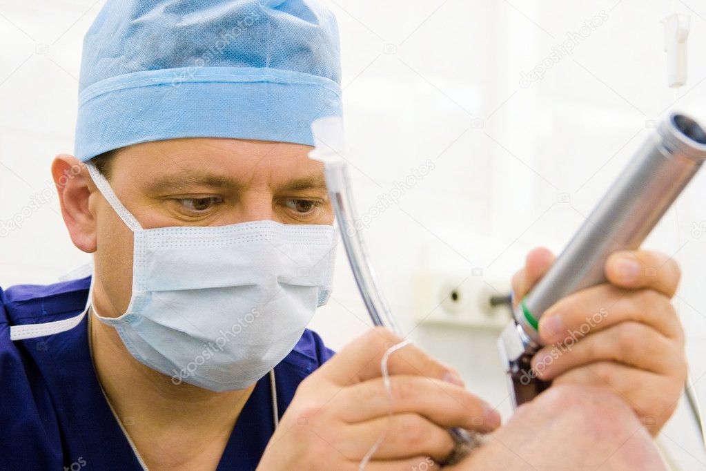 Anaesthesiologist performing endotracheal intubation