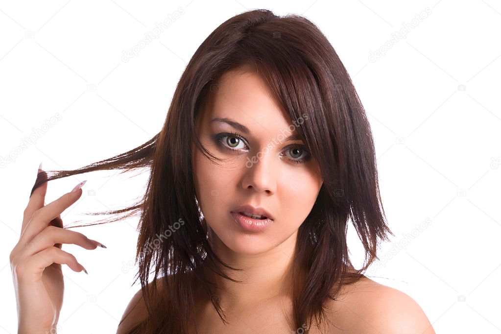 Young attractive brunette woman with long hairs