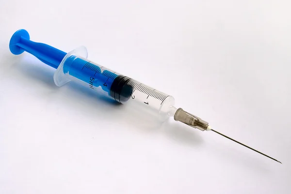 Blue syringe — Stock Photo, Image