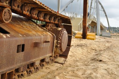 Excavator track close-up clipart