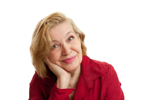 stock image Senior Woman in red smiling on white background