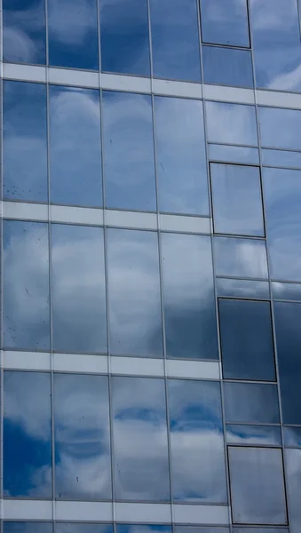 stock image Sky and clouds reflected in modern window