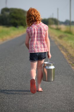 Young girl with milk can clipart