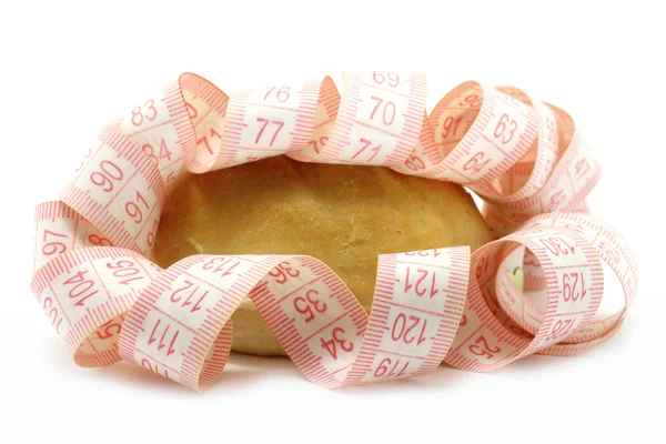 Pequeño pan y cinta métrica —  Fotos de Stock