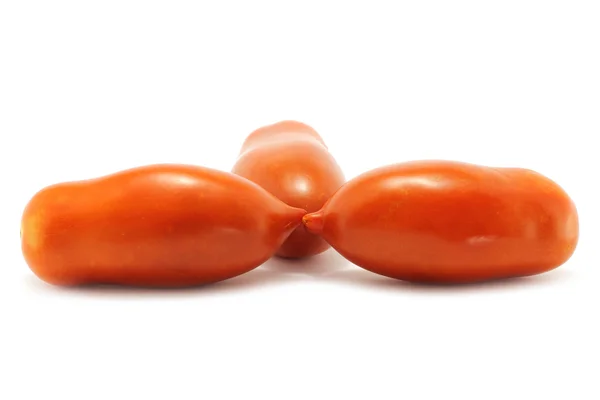 Три помідори — стокове фото