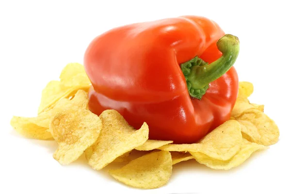 Čipy a červené paprica — Stock fotografie