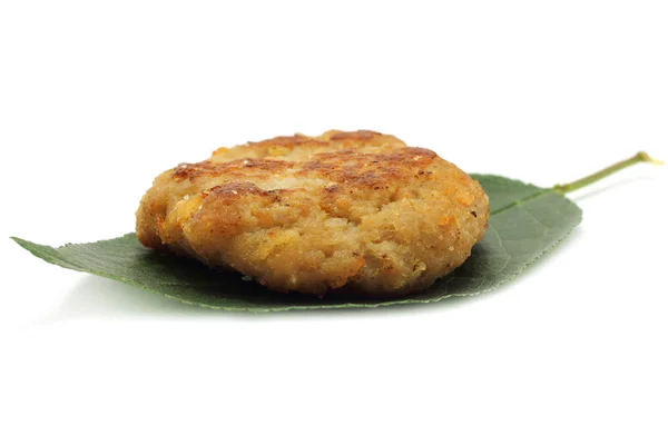 Cutlet on the green leaf — Stock Photo, Image