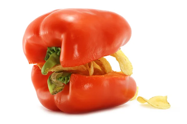 Čipy uvnitř červená paprica — Stock fotografie