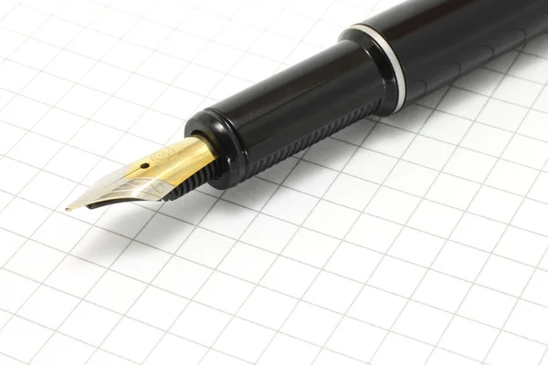 Penna på notepad — Stockfoto