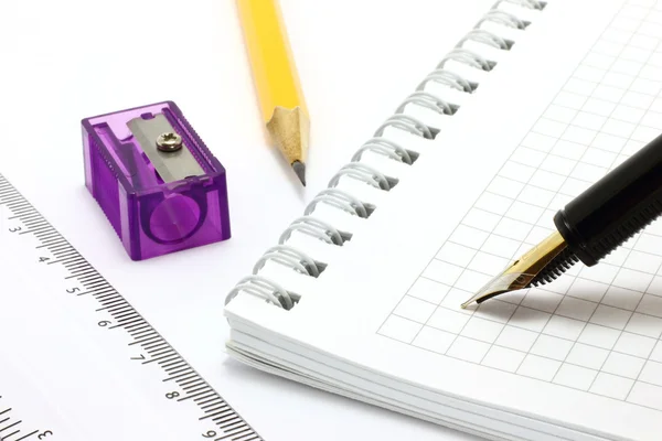 Notepad with stationary objects — Stock Photo, Image