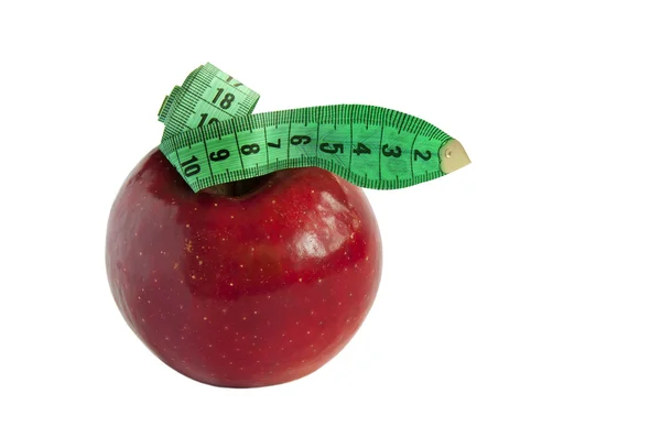 Kırmızı elma ile yeşil şerit metre — Stok fotoğraf