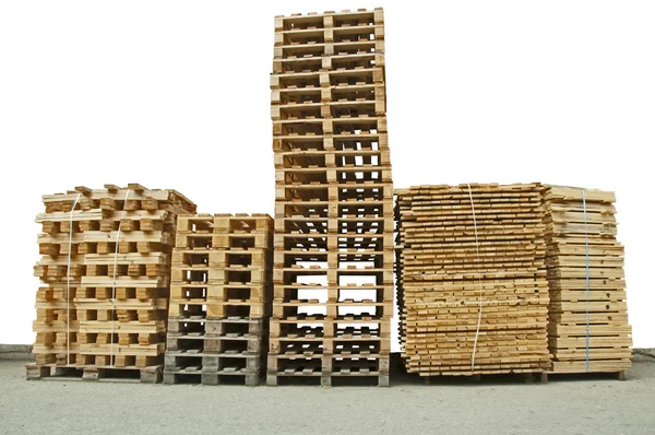 Pilas de paletas de madera nuevas — Foto de Stock
