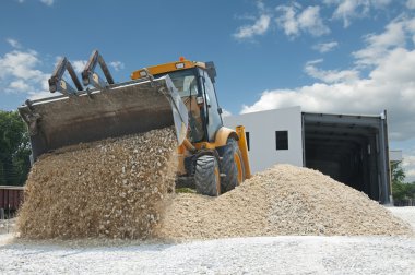 Excavator unload gravel clipart