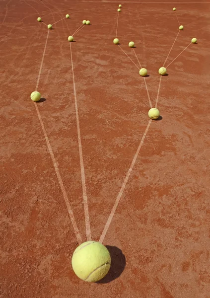 Üzleti metafora-val tenisz labdák — Stock Fotó