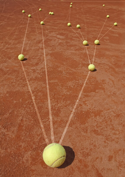 Business metaphor with tennis balls