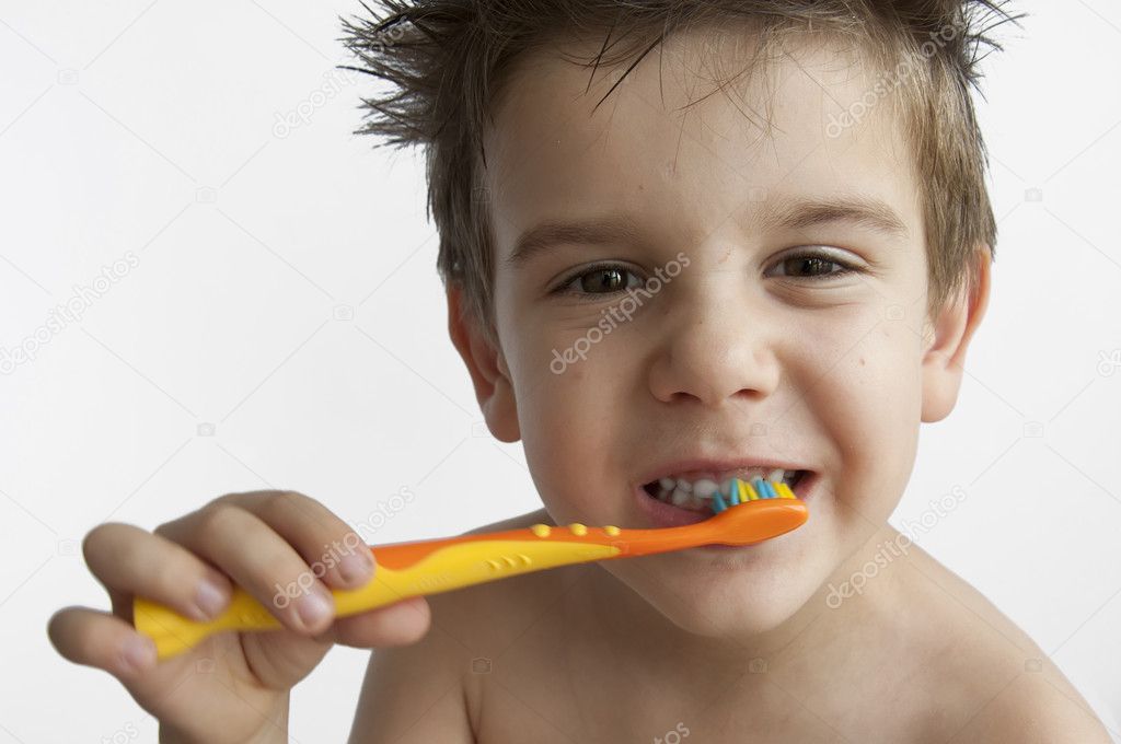 Boy washing teeth