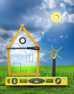 House with tree and sun made of tools for building.White isolate clipart