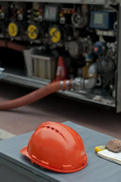 stock image Fuel truck and helmet close up