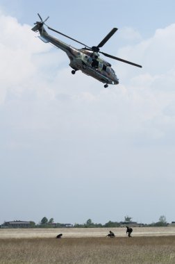 Military operation with helicopters clipart