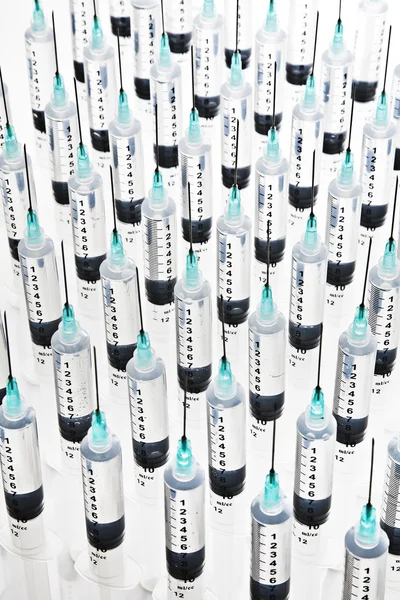 Rows of syringes — Stock Photo, Image
