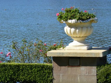 Urn by the lake clipart