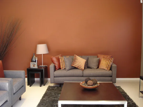 Warmes Wohnzimmer Orangen Stockfoto