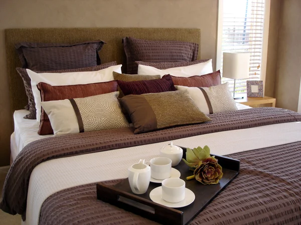 Breakfast in bed - master suite in earthy tones — Stock Photo, Image